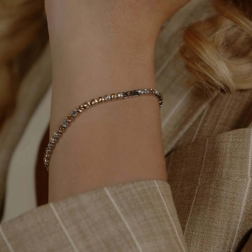 Silver Tone Tennis Bracelet With Clear & Champagne Crystals
