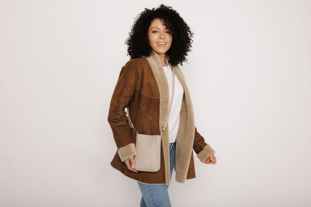 Kensington Phone Crossbody Bag In Stone
