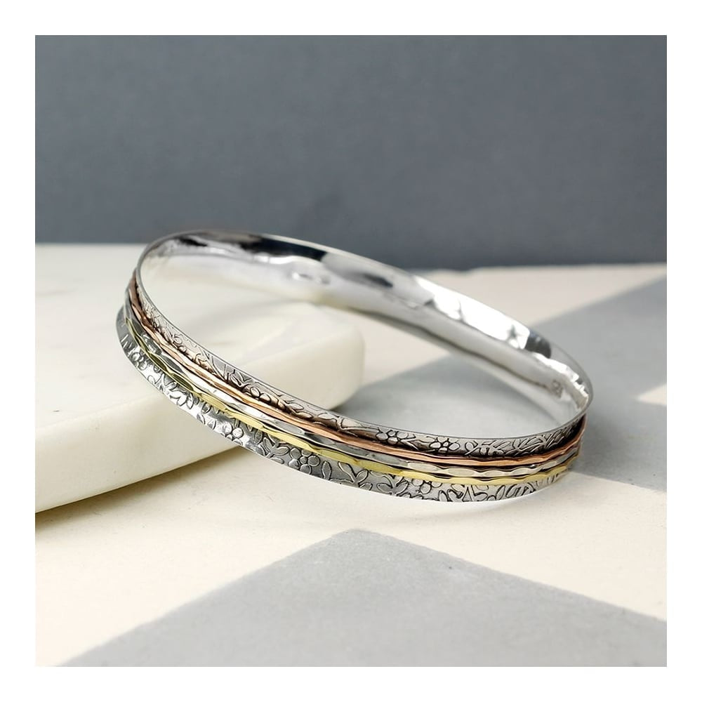 Sterling Silver Flower Bangle With Three Spinning Bands