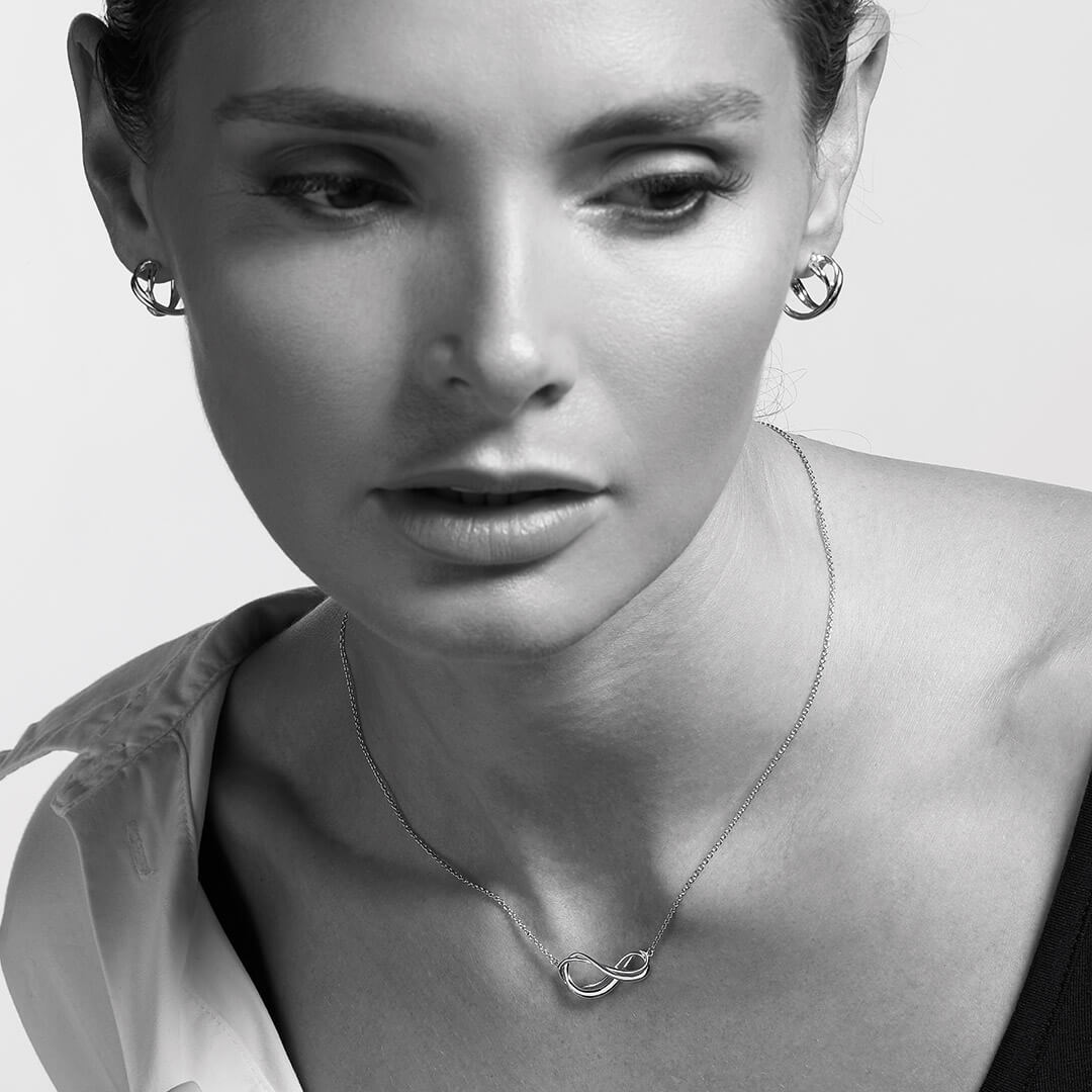 Infinity Semi Hoop Stud Earrings