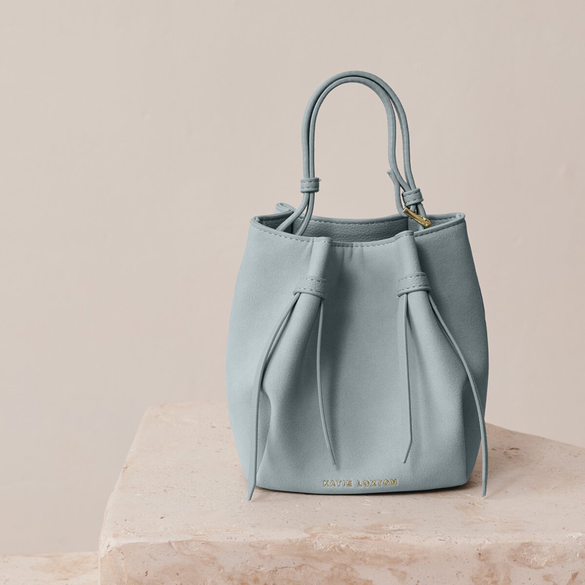 Celina Mini Suedette Bucket Bag In Blue Mist