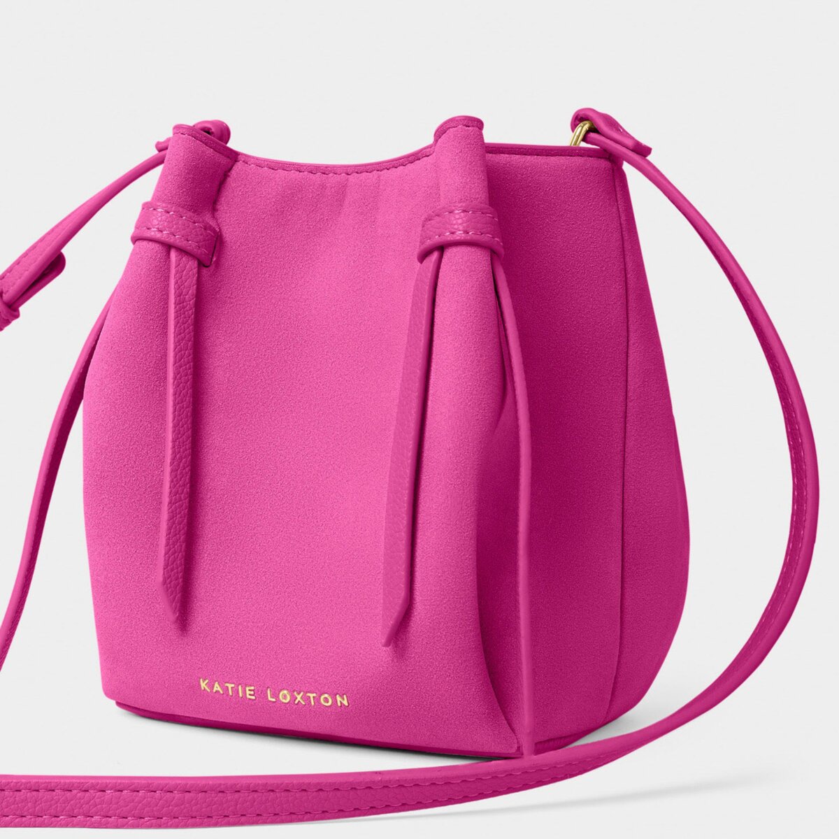 Celina Mini Suedette Bucket Bag In Magenta