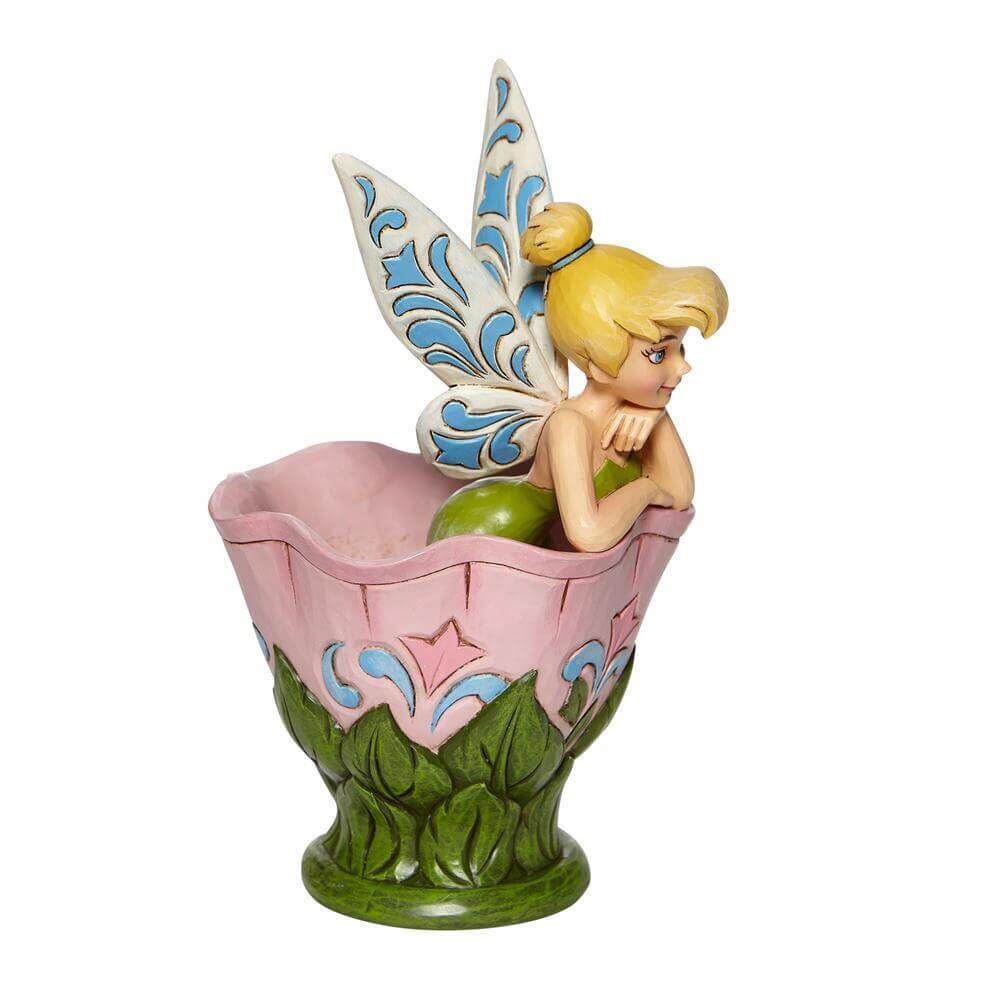 Tinkerbell Sitting In A Flower