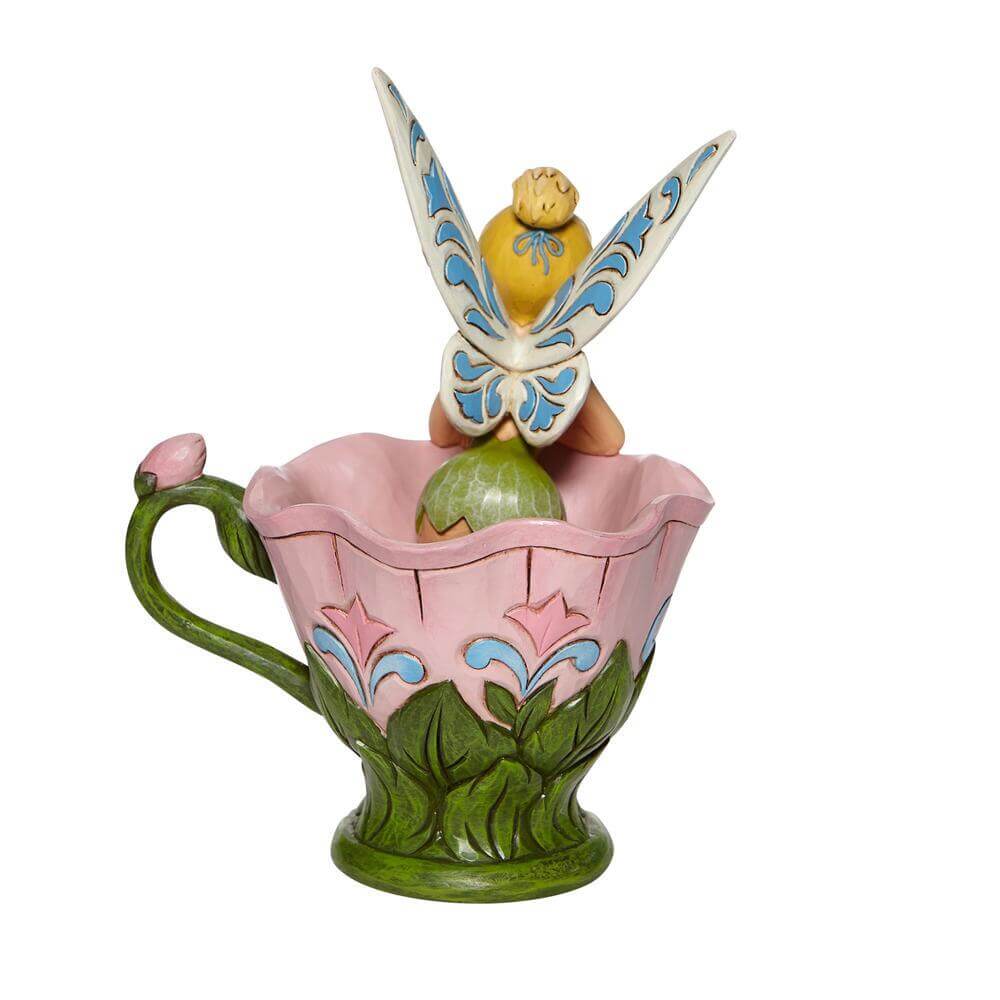 Tinkerbell Sitting In A Flower