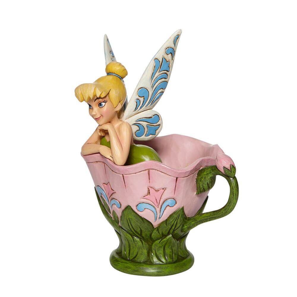 Tinkerbell Sitting In A Flower