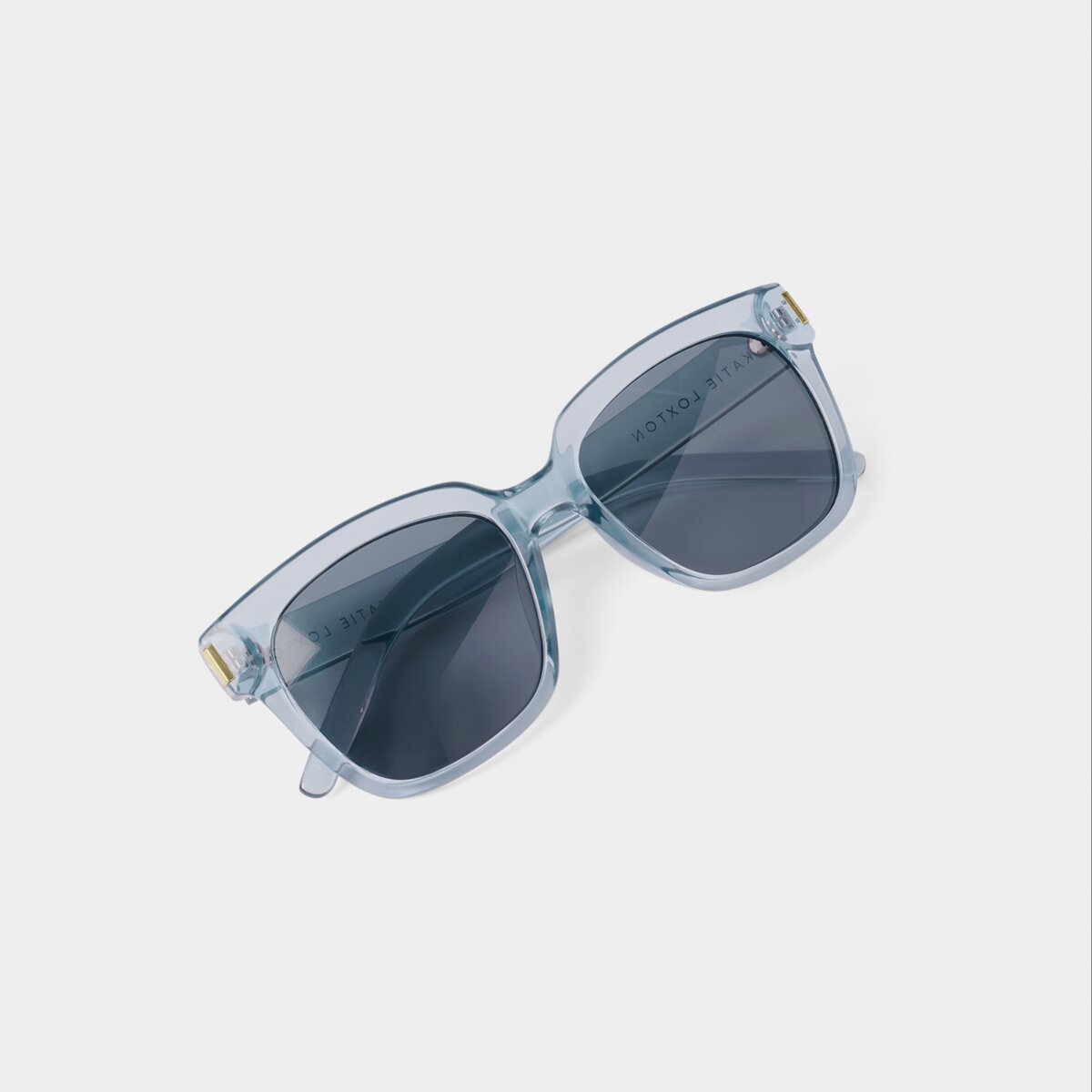 Roma Sunglasses in Blue Transparent